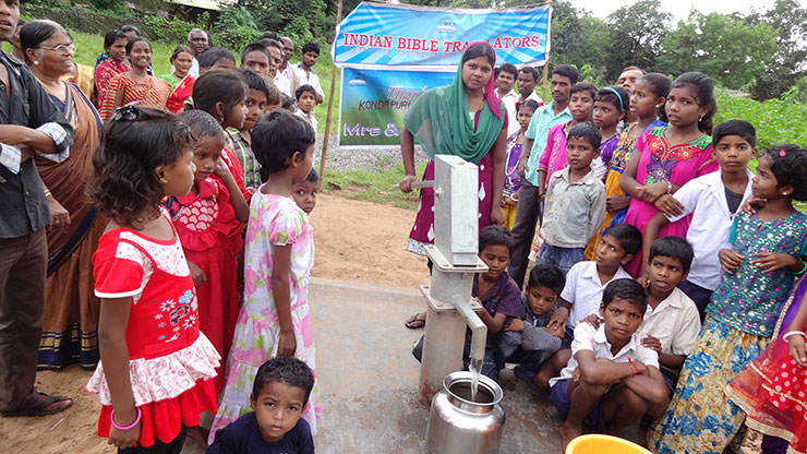 Drinking Water Facility - Community members using the hand pump provided by Indian Bible Translators